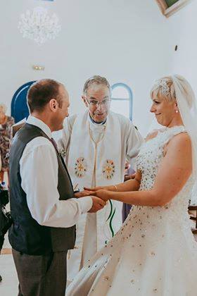 Intimate wedding moment during Anglican Marriage Ceremony in Paphos, Cyprus