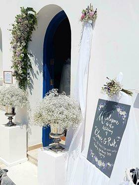 Sunshine and flowers decorate the church before the wedding by the Anglican Church of Paphos