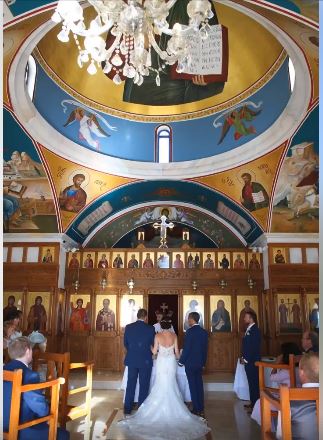 Church of England Wedding in St Nicholas's Chapel, Paphos. Bright and colourful.